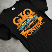 Black T-shirt laid flat with natural fabric folds, featuring Pontiac GTO rs muscle street retro vintage classic graphic.