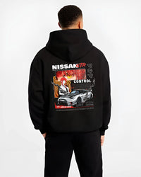 Black hoodie worn by a male model, back view, featuring Nissan Skyline R34 gtr r34 skyline turbo turbocharged racing drift graphic.