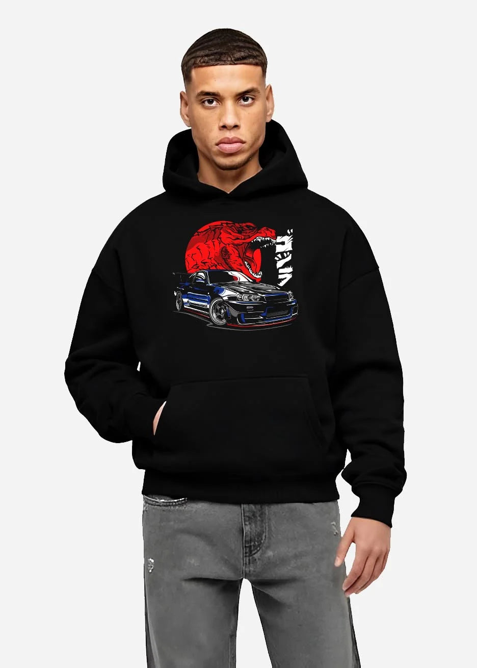 Black hoodie worn by a male model, front view, featuring Nissan Skyline R34 r34 skyline drift jdm japanese street graphic.