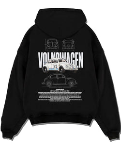 Black pullover hoodie laid flat on a white background, featuring Volkswagen Beetle racing classic legend street performance graphic.