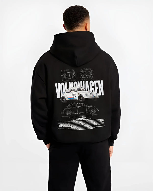 Black hoodie worn by a male model, back view, featuring Volkswagen Beetle racing classic legend street performance graphic.