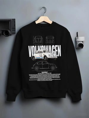Black crewneck sweatshirt on a hanger against a grey wall, featuring Volkswagen Beetle racing classic legend street graphic.