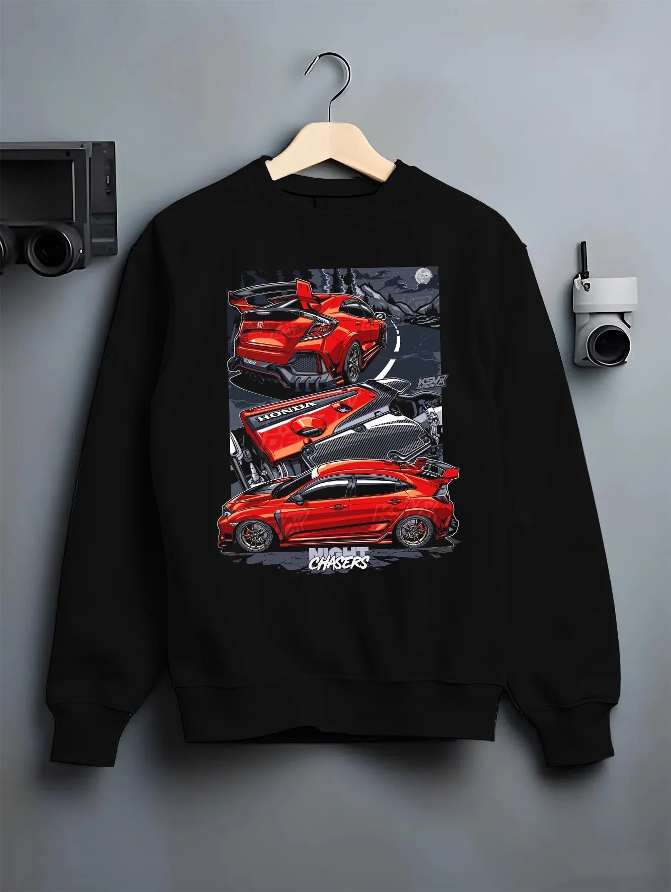 Black crewneck sweatshirt on a hanger against a grey wall, featuring Honda Civic racing drift jdm japanese tuning street graphic.