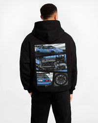 Black hoodie worn by a male model, back view, featuring Honda Civic racing track jdm japanese street performance graphic.