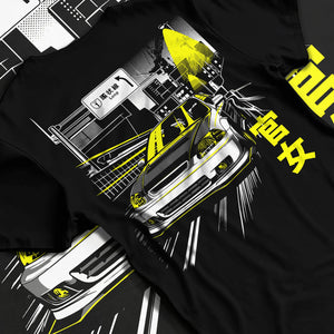 Black T-shirt laid flat with natural fabric folds, featuring Honda Civic racing drift jdm japanese street performance graphic.
