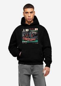 Black hoodie worn by a male model, front view, featuring Honda rs racing motorsport street retro classic speed graphic.