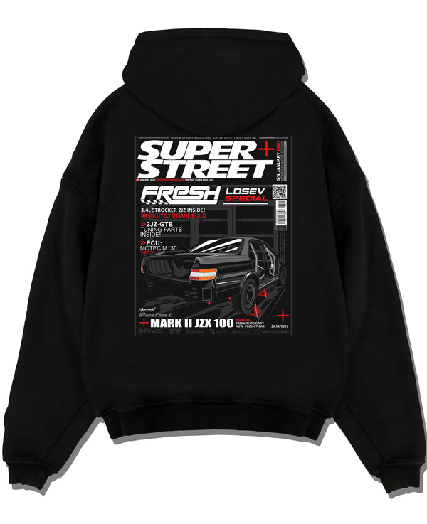 Black pullover hoodie laid flat on a white background, featuring Toyota JZX100 turbo drift street racing performance graphic.