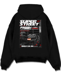Black pullover hoodie laid flat on a white background, featuring Toyota JZX100 turbo drift street racing performance graphic.