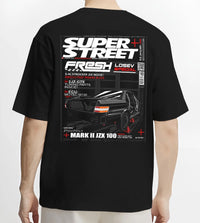 Black T-shirt worn by a male model, back view, featuring Toyota JZX100 turbo drift street racing performance motorsport graphic.