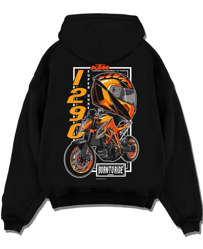 Black pullover hoodie laid flat on a white background, featuring KTM racing street performance motorsport automotive graphic.