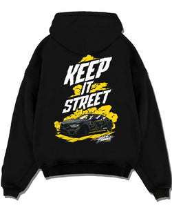 Black pullover hoodie laid flat on a white background, featuring turbo racing drift tuner street performance motorsport graphic.