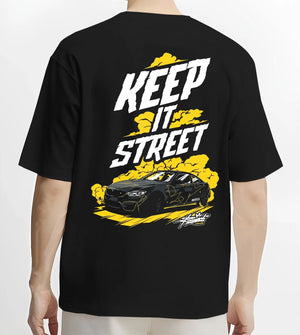 Black T-shirt worn by a male model, back view, featuring turbo racing drift tuner street performance motorsport automotive graphic.