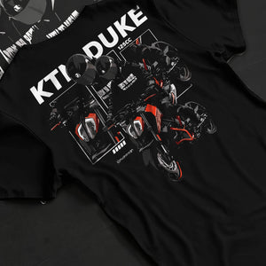 Black T-shirt laid flat with natural fabric folds, featuring KTM rs racing street performance motorsport automotive graphic.