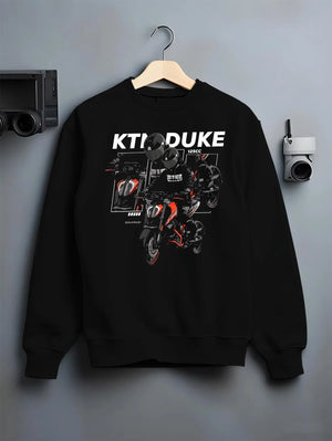 Black crewneck sweatshirt on a hanger against a grey wall, featuring KTM rs racing street performance motorsport automotive graphic.