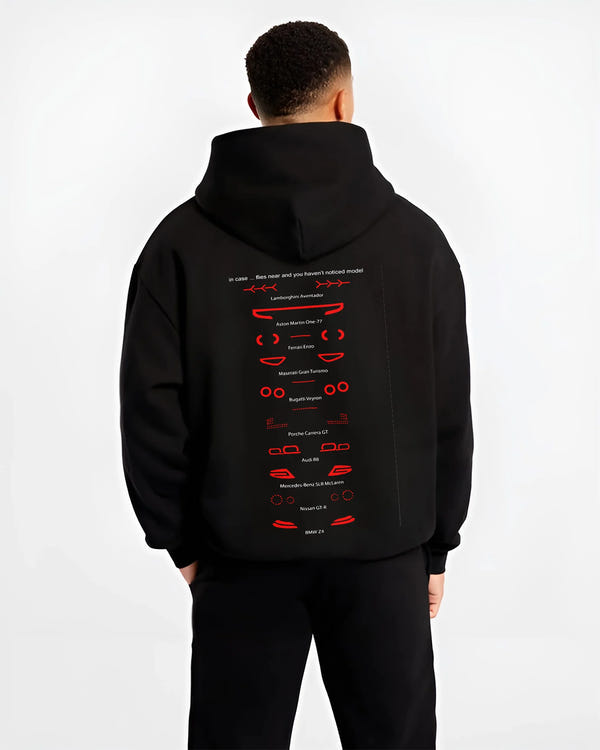 Black hoodie worn by a male model, back view, featuring Lamborghini Aventador racing italian tuning street performance graphic.