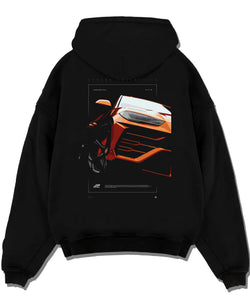 Black pullover hoodie laid flat on a white background, featuring Lamborghini street racing performance motorsport graphic.