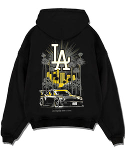 Black pullover hoodie laid flat on a white background, featuring racing street performance motorsport automotive enthusiast larun.