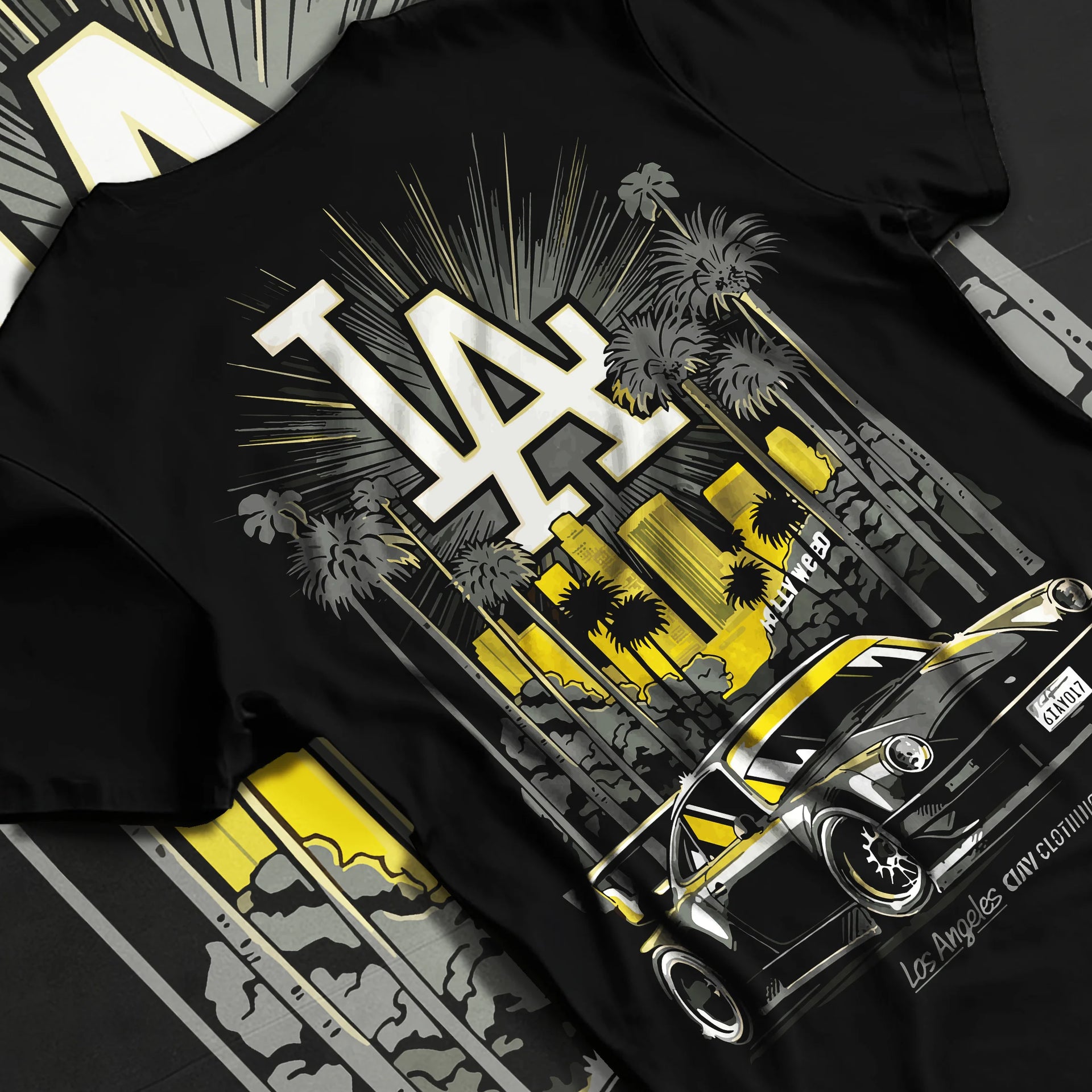 Black T-shirt laid flat with natural fabric folds, featuring racing street performance motorsport automotive enthusiast larun.