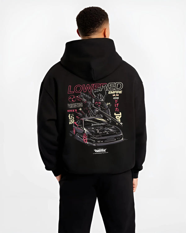 Black hoodie worn by a male model, back view, featuring drift drifting japanese tuner lowered street racing performance graphic.