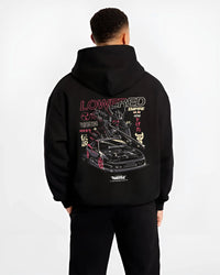 Black hoodie worn by a male model, back view, featuring drift drifting japanese tuner lowered street racing performance graphic.