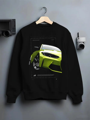 Black crewneck sweatshirt on a hanger against a grey wall, featuring BMW M3 rs turbo racing motorsport german street graphic.