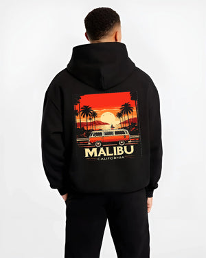 Black hoodie worn by a male model, back view, featuring retro vintage racing street performance motorsport automotive graphic.