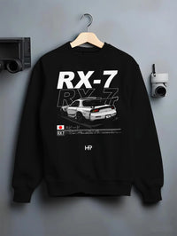 Black crewneck sweatshirt on a hanger against a grey wall, featuring Mazda RX--7 rx 7 racing drift jdm japanese street mazr2.