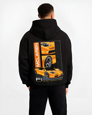 Black hoodie worn by a male model, back view, featuring McLaren 720S rs racing enthusiast street performance motorsport graphic.