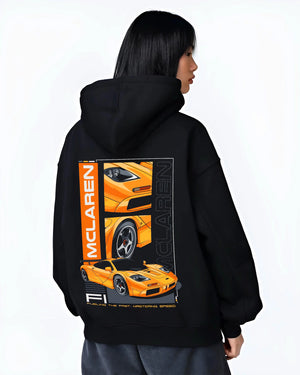 Black hoodie worn by a female model, back view, featuring McLaren 720S rs racing enthusiast street performance motorsport graphic.
