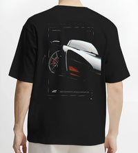 Black T-shirt worn by a male model, back view, featuring McLaren F1 rs racing street retro speed enthusiast graphic.