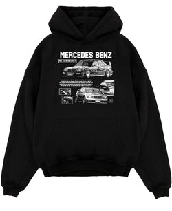Black pullover hoodie laid flat on a white background, featuring Mercedes-Benz AMG rs racing motorsport street enthusiast graphic.