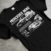 Black T-shirt laid flat with natural fabric folds, featuring Mercedes-Benz AMG rs racing motorsport street enthusiast graphic.