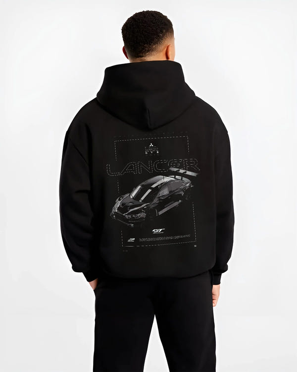 Black hoodie worn by a male model, back view, featuring Mitsubishi EVO turbo turbocharged racing drift jdm japanese tuner graphic.