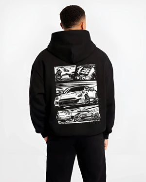 Black hoodie worn by a male model, back view, featuring Nissan GT-R gt r racing drift jdm japanese street graphic.