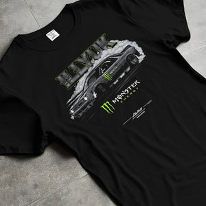 Black T-shirt laid flat with natural fabric folds, featuring rs turbo racing drift motorsport tuner street monster graphic.