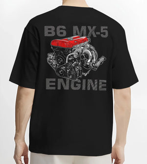 Black T-shirt worn by a male model, back view, featuring Mazda MX-5 jdm tuner street racing performance motorsport graphic.