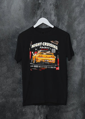 Black crewneck T-shirt on a hanger against a grey wall, featuring racing drift jdm japanese tokyo street tokyo drift graphic.