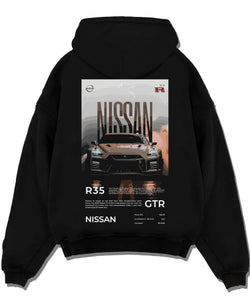 Black pullover hoodie laid flat on a white background, featuring Nissan GT-R R35 gt r r35 turbo racing street legend graphic.