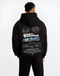 Black hoodie worn by a male model, back view, featuring Nissan Skyline R32 r32 skyline turbo racing drift jdm japanese graphic.