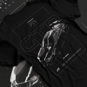 Black T-shirt laid flat with natural fabric folds, featuring Nissan 300ZX turbo turbocharged drift jdm japanese tuner graphic.