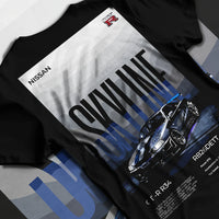 Black T-shirt laid flat with natural fabric folds, featuring Nissan Skyline R34 gt r r34 skyline rb26 jdm legend graphic.