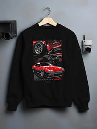 Black crewneck sweatshirt on a hanger against a grey wall, featuring Nissan Silvia turbo turbocharged racing drift jdm graphic.
