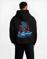 Black hoodie worn by a male model, back view, featuring Nissan Skyline R34 gt r r34 skyline drift jdm japanese street graphic.