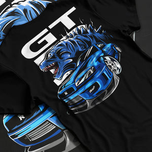 Black T-shirt laid flat with natural fabric folds, featuring Nissan GT-R R34 gt r r34 skyline turbo drift jdm japanese graphic.