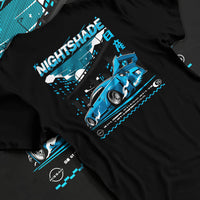 Black T-shirt laid flat with natural fabric folds, featuring Nissan GT-R R35 gt r r35 skyline racing drift jdm japanese graphic.
