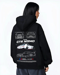 Black hoodie worn by a female model, back view, featuring Nissan Skyline R34 gtr r34 skyline turbo turbocharged racing nis7.