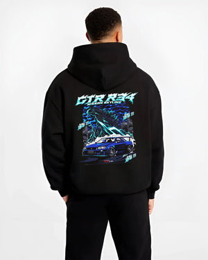 Black hoodie worn by a male model, back view, featuring Nissan Skyline R34 gtr r34 skyline racing drift jdm japanese tuner graphic.