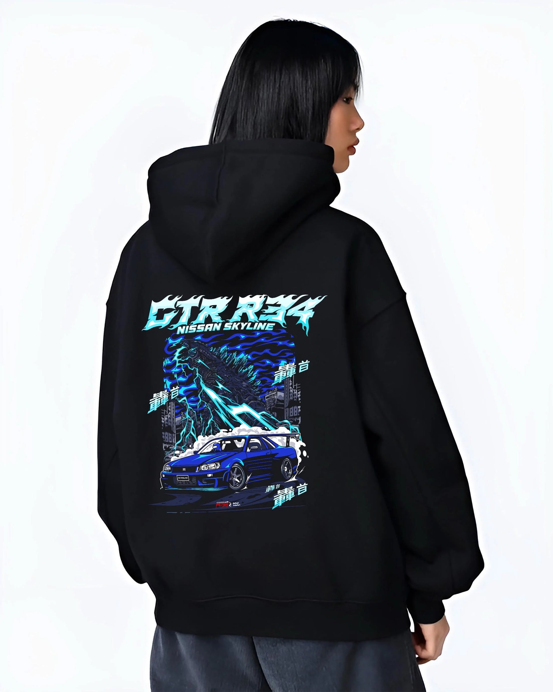 Black hoodie worn by a female model, back view, featuring Nissan Skyline R34 gtr r34 skyline racing drift jdm japanese graphic.