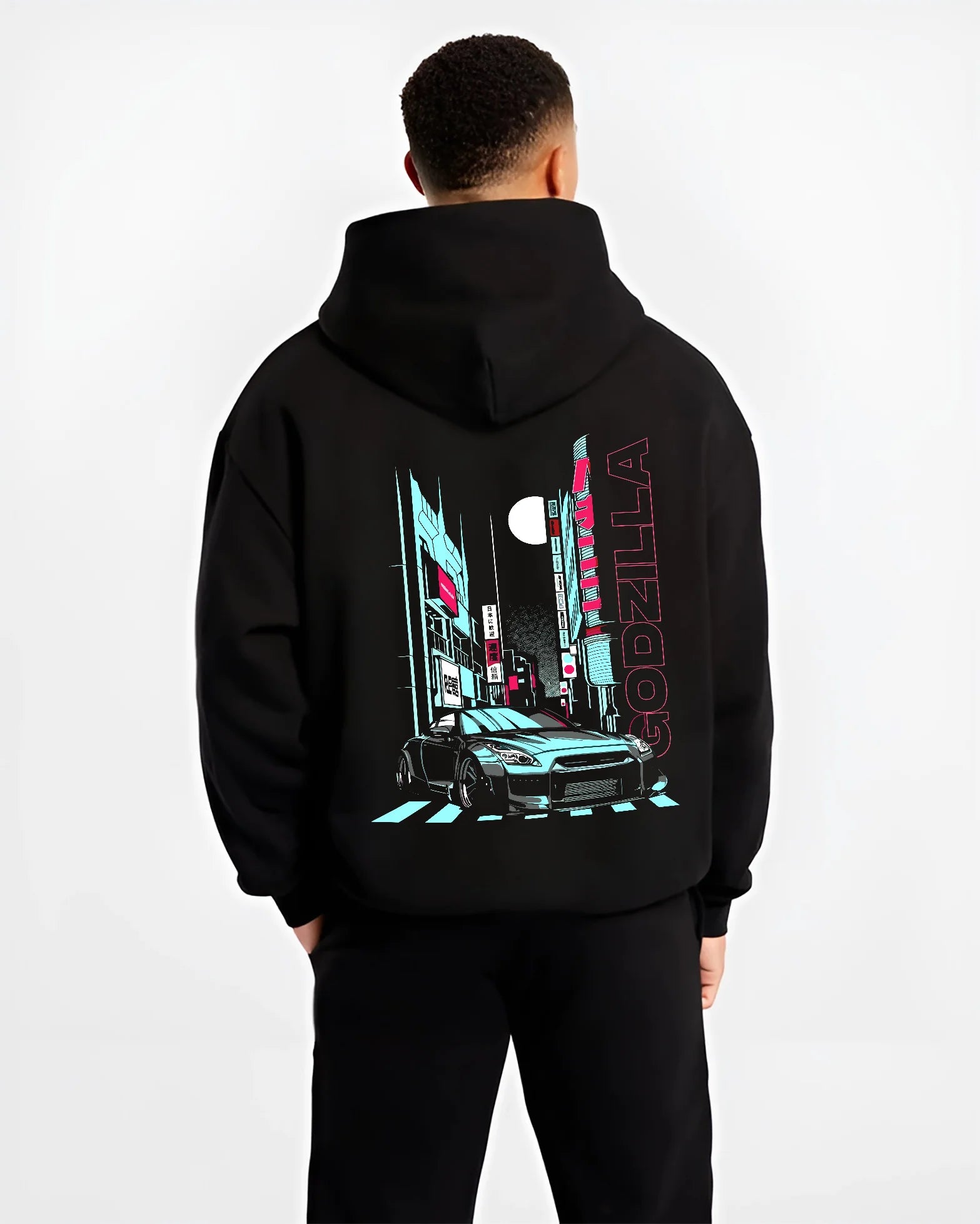 Black hoodie worn by a male model, back view, featuring Nissan GT-R gtr skyline racing drift jdm japanese street graphic.