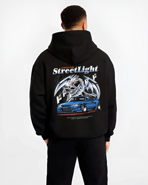 Black hoodie worn by a male model, back view, featuring Nissan Skyline R34 rs r34 skyline turbo racing drift motorsport jdm graphic.